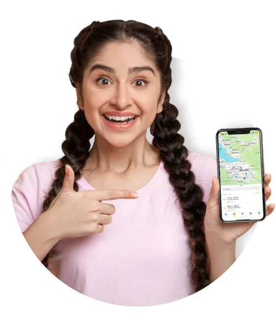 Smiling woman pointing to a phone showing the Loop store finder map